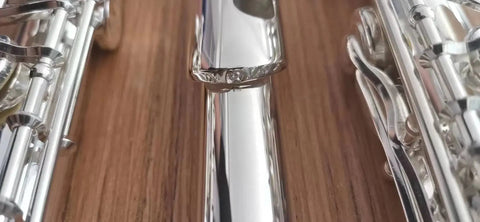 17-key intermediate open-hole flute made of 925 silver, featuring French, C, and E keys, ideal for student and advancing musicians